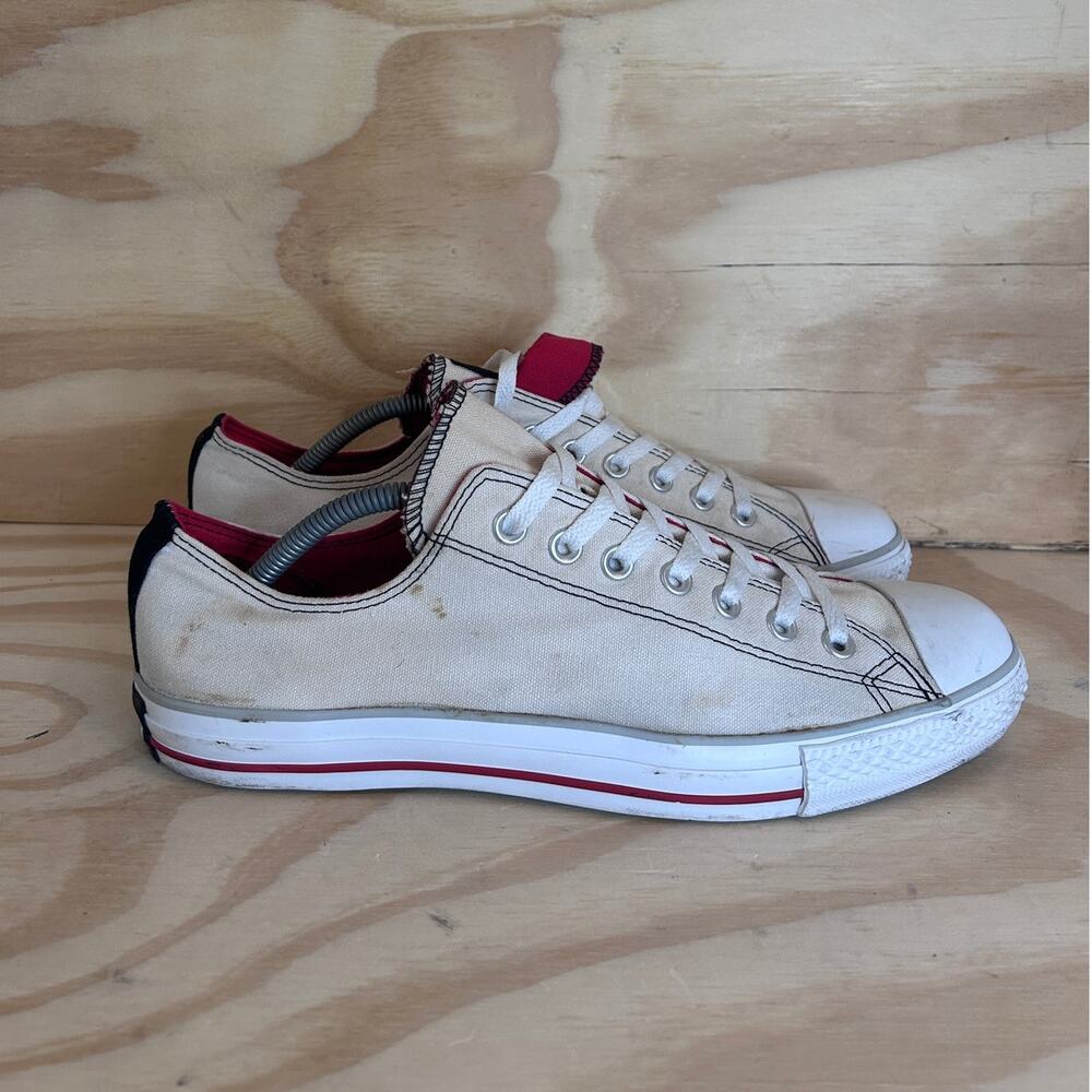 Converse Low Top Sneakers in Cream with Red and Black Accents